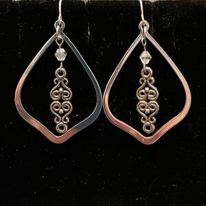 Handcrafted silver earrings.